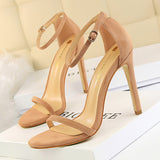 High-heeled suede open-toe pumps